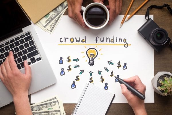 Crowdfunding Concept. Two People Deciding To Find Business Idea
